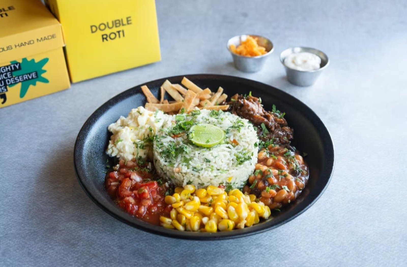Food spread at Double Roti, Chennai — burgers, nachos, tacos