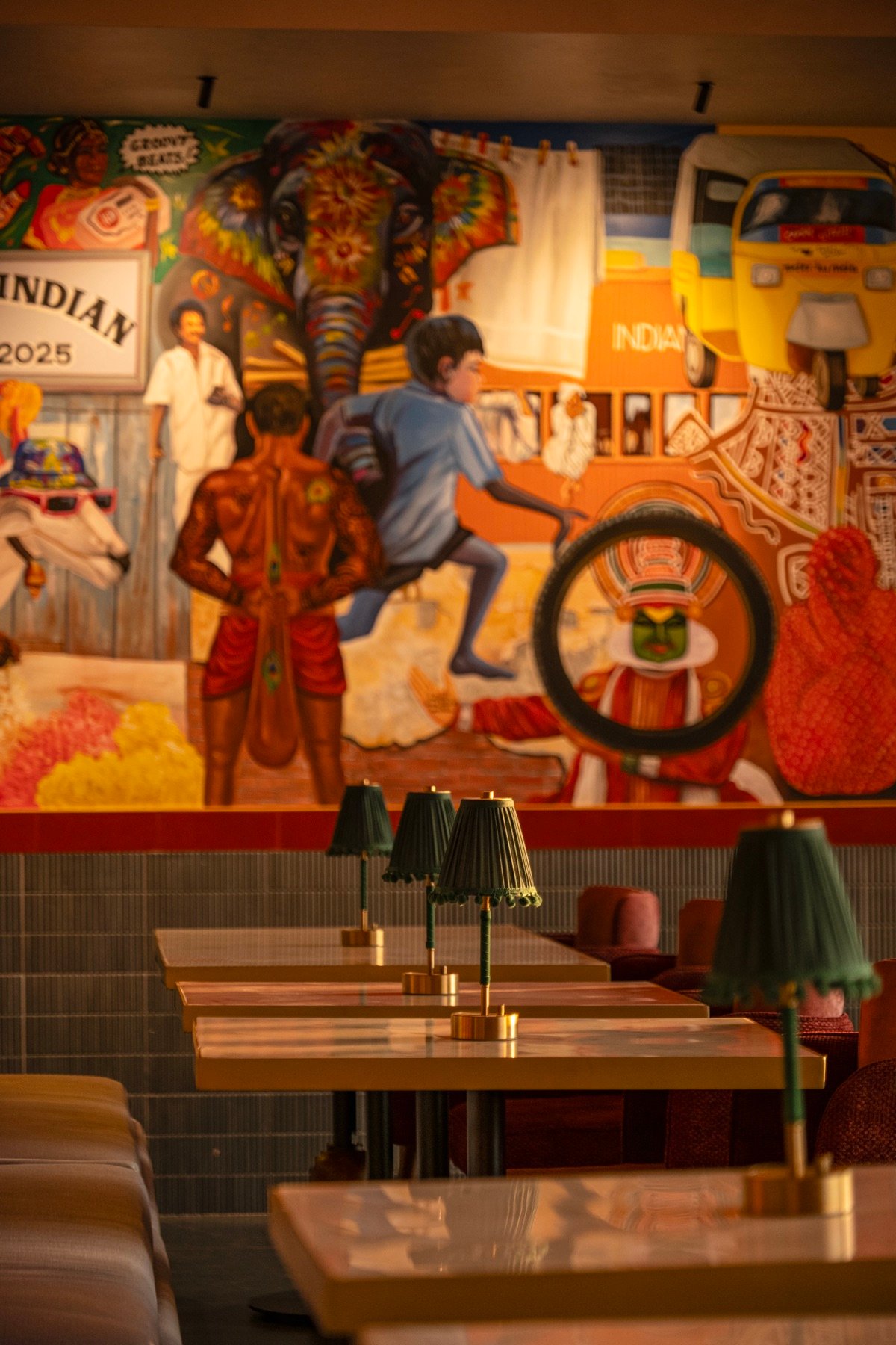 Jolly Indian modern Indian restaurant, Alwarpet Chennai — retro festive interiors and pop culture wall art